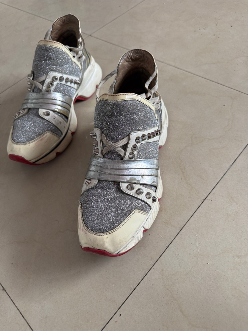 Christian Louboutin silver glitter slip on sneakers